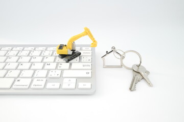 clavier clés et tractopelle