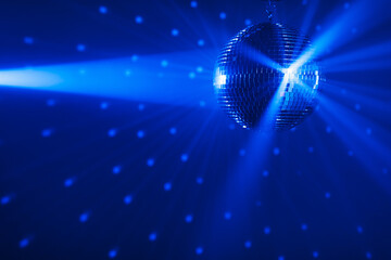 disco ball background with blue shiny rays