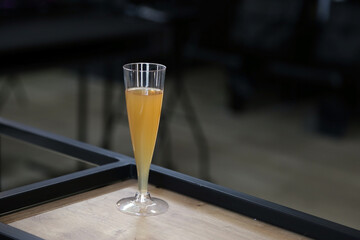 drunk glass with beer on the table