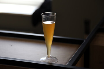 drunk glass with beer on the table