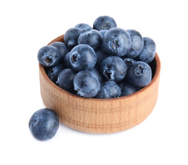 Fresh ripe blueberries in bowl on white background