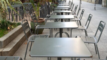 Italy , Milan October 2020 - Corso Sempione - Empty tables, closed pubs, restaurants, bars and venues due to coronavirus, covid-19 outbreak. Al businesses with public are temporary closed