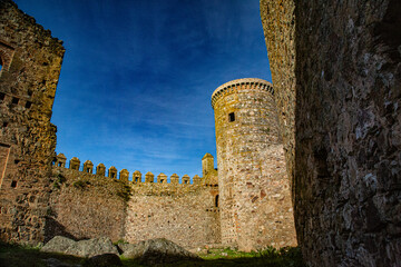Ancient castle interior with well preserved tower and walls