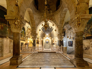 Fototapeta premium Church of the Holy Sepulchre interior with XII century Chapel of Saint Helena in Christian Quarter of historic Old City of Jerusalem, Israel