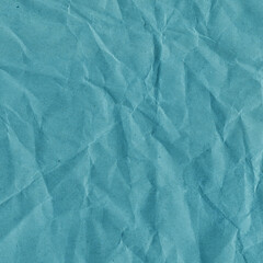 Obraz premium Blue vintage and old looking crumpled paper background. Retro cardboard texture. Grunge paper for drawing. Ancient book page. Present wrapping.