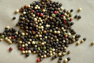 Macro shot image of Different color mixed peppercorns. Concept of food ingredients and spices. Copy space and top view.