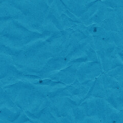 Blue vintage and old looking crumpled paper background. Retro cardboard texture. Grunge paper for drawing. Ancient book page. Present wrapping.