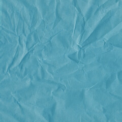 Obraz premium Blue vintage and old looking crumpled paper background. Retro cardboard texture. Grunge paper for drawing. Ancient book page. Present wrapping.