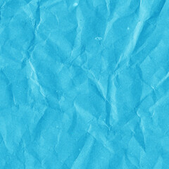 Blue vintage and old looking crumpled paper background. Retro cardboard texture. Grunge paper for drawing. Ancient book page. Present wrapping.