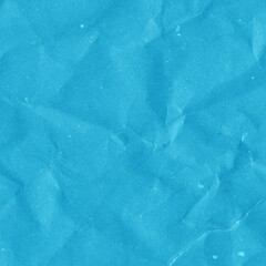 Blue vintage and old looking crumpled paper background. Retro cardboard texture. Grunge paper for drawing. Ancient book page. Present wrapping.