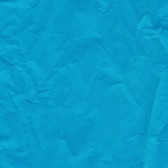 Obraz premium Blue vintage and old looking crumpled paper background. Retro cardboard texture. Grunge paper for drawing. Ancient book page. Present wrapping.