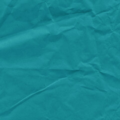 Blue vintage and old looking crumpled paper background. Retro cardboard texture. Grunge paper for drawing. Ancient book page. Present wrapping.