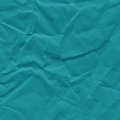 Blue vintage and old looking crumpled paper background. Retro cardboard texture. Grunge paper for drawing. Ancient book page. Present wrapping.