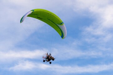 Paraglider flying free in the sky