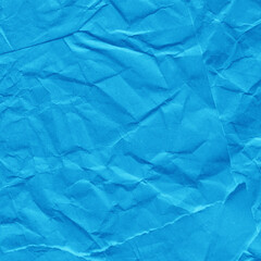 Blue vintage and old looking crumpled paper background. Retro cardboard texture. Grunge paper for drawing. Ancient book page. Present wrapping.