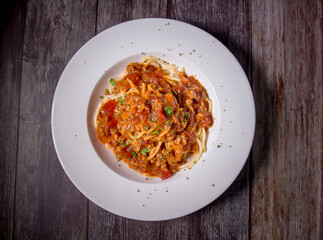 Delicious spaghetti served on a white plate