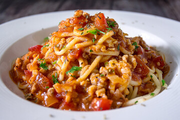 Delicious spaghetti served on a white plate