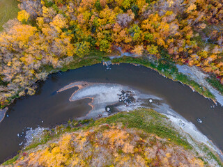 Aerial View of Winding River with Colorful Autumn Trees in Rural North Dakota.