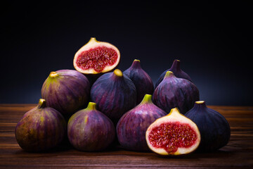 Tasty figs on a black background. Top view.