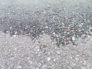 Background the asphalt on half of the wet.