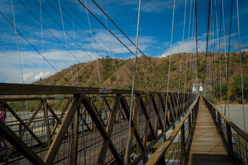 Obraz premium Santa Fe de Antioquia / Colombia - January 21, 2018. Puente de Occidente (Western Bridge) in Santa Fe de Antioquia, Colombia