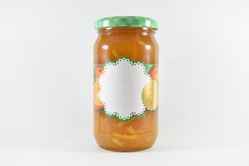 different glass jars filled on a white background