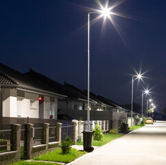 street in a residential area with modern street lights