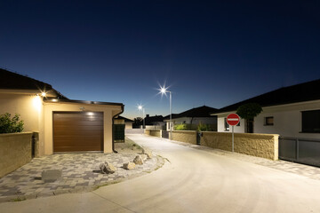 street in a residential area with modern street lights