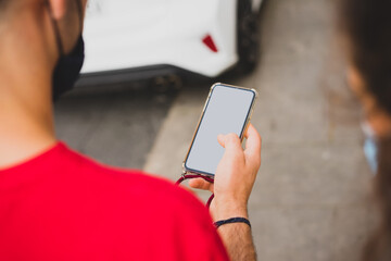 Mockup of a man using his smartphone