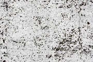 Texture of a concrete wall with cracks and scratches which can be used as a background