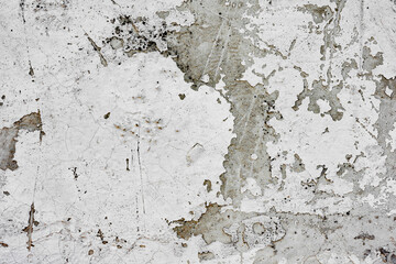 Texture of a concrete wall with cracks and scratches which can be used as a background