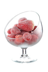 Frozen strawberries in a glass bowl. Isolated on white background.