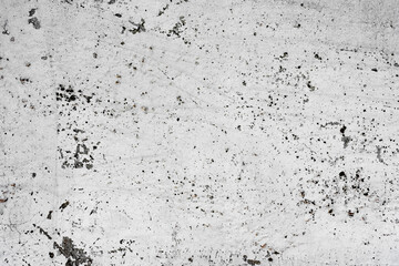 Texture of a concrete wall with cracks and scratches which can be used as a background