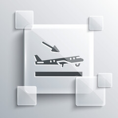 Grey Plane landing icon isolated on grey background. Airplane transport symbol. Square glass panels. Vector.