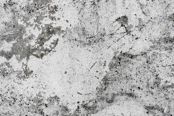 Texture of a concrete wall with cracks and scratches which can be used as a background