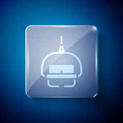 White Ski lift icon isolated on blue background. Square glass panels. Vector.