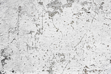 Obraz premium Texture of a concrete wall with cracks and scratches which can be used as a background