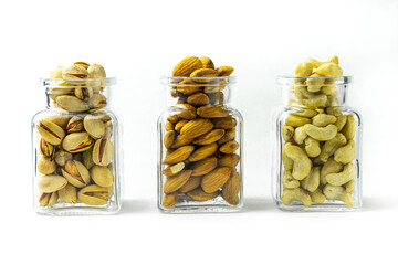 Fried salted nuts. Isolated on a white background