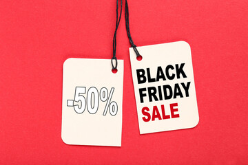 Sale tag with text Black Friday Sale on red background