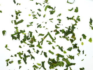 Fresh chopped  celery leaves isolated on white. Aromatic Spice celery leaves.