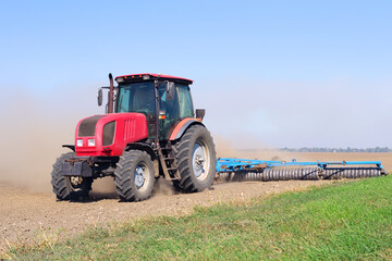 disking the field after harvest for better fertilization of the soil and getting rid of weeds