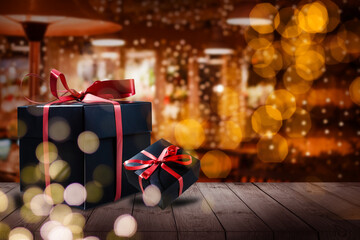 Shelf and podium with realistic black gifts boxes with gold bows. Dark background golden text lettering. Horizontal banner, poster, header website