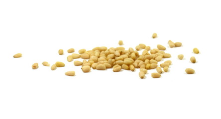 peeled pine nuts isolated on a white background 