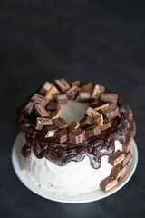 Cake with cookies and pieces of chocolate 