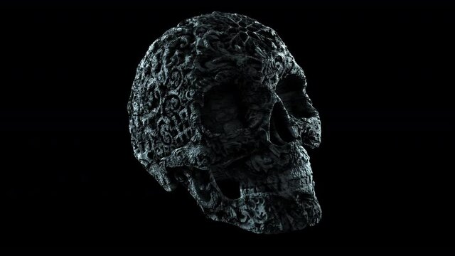 Seamless elegant animation carving stone skull with alpha channel. Hypnotic halloween dark background.
