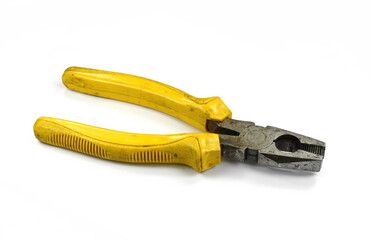 Old rusty pliers on white background.