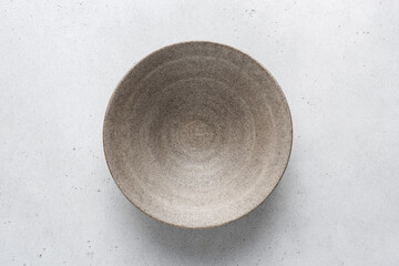 Homemade grey ceramic bowl. Craft ceramics, pottery concept - 386489249