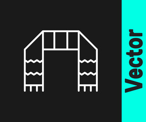 White line Winter scarf icon isolated on black background. Vector.