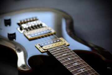 Fototapeta na wymiar Electric guitar on a dark background.
