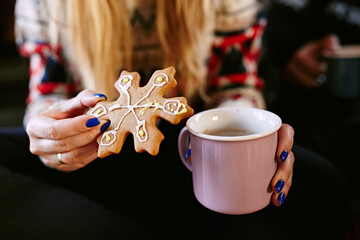 Cup of coffee and christmas cookies. Gingerbread.